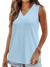 Light blue eyelet v neck tank top with sleeveless design and subtle perforated texture for casual wear