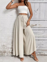 Beige high-waisted wide leg casual pants with elastic drawstring waist for comfortable everyday wear
