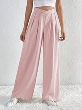 Soft pink v-waisted ruched front wide leg pants featuring a flattering cross-front waistband and high waist design