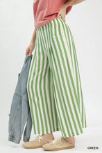 Umgee green and white vertical stripe wide leg pants with a loose fit for stylish and comfortable wear