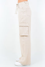 Beige American Bazi full size drawstring wide leg cargo pants with multiple pockets and a comfortable drawstring waist