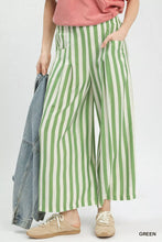 Umgee green and white vertical stripe wide leg pants with a flowy fit perfect for casual or workwear