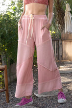 Pink pol elastic waistband wide leg pants with drawstring and ribbed patchwork fabric panels for comfortable wear