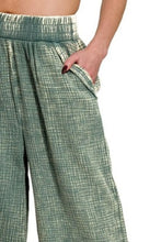 Green and white checkered wide-leg pants feature a sage green double gauze fabric with an elastic waistband by zenana