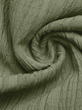 Olive green ribbed knit wide leg drawstring waist pants featuring a textured raised pattern and comfortable fit