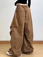Brown wide leg casual drawstring cargo pants with relaxed fit and two large front pockets for perfect fit