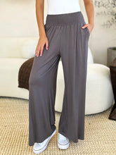 Gray wide-leg pants from basic bae featuring a stretchy smocked wide waistband for comfortable fit and easy care instructions