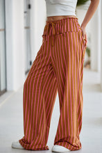 Wide leg stripe button pocket tie waist casual pants in coral and orange with elastic waistband and drawstring