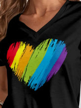 Black V-neck t-shirt with rainbow heart and dropped shoulder sleeves