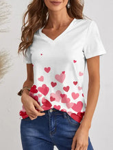 Woman in FAM-FAM Heart V-Neck Short Sleeve T-Shirt with red pink hearts