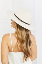 Cream-colored Fame Keep It Classy wide brim fedora hat with black band and gold buckle