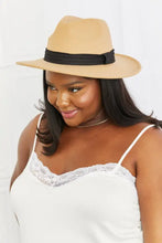 Dark tan fedora hat with black band from Fame You Got It collection
