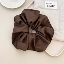 Brown faux leather elastic hair scrunchy with satin bow in brown