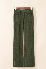 High waist square pockets corduroy pants in olive green with wide legs, two front pockets, and button closure
