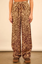 Brown and beige animal print linen wide leg pants with high waist and drawstring waistband from very j