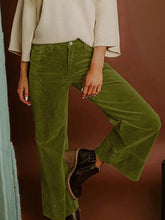 Olive green corduroy solid color high waist wide leg pants made from durable corduroy fabric in a solid color design