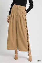 Tan umgee front pleated wide-leg pants featuring leopard print contrast trim on the side stripe