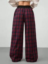 Red and black plaid wide leg pants with elastic drawstring waist for comfortable casual wear