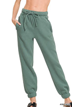 Moss green zenana fleece drawstring joggers with pocket featuring elastic cuffs and a comfortable waistband
