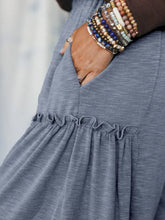 A soft heathered gray casual wide leg dress with ruffled hemline suitable for relaxed wear