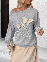 Gray floral applique boat neck sweatshirt with cream tulip appliqués slightly stretchy and machine wash cold