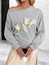Gray floral applique boat neck sweatshirt with cream tulip appliqués and white stems, slightly stretchy, machine wash cold