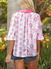 Floral collared ruffled half sleeve shirt with pink and lavender floral print and bright pink collar detail