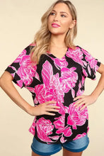 Floral drop shoulder V-neck blouse with pink print and cuffed denim shorts set