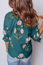 Teal floral embroidered notched blouse with pink poppy embroidery and ruffled three-quarter sleeves