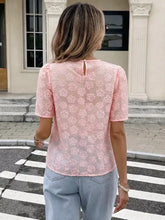 Pink floral embroidered lace blouse with short sleeves and keyhole back detail featuring pearl trim