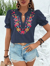 Navy blue floral embroidered puff sleeve blouse with vibrant red yellow and pink floral embroidery across chest