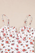 White floral print bodysuit with ruched neckline and thin adjustable frilled trim spaghetti straps