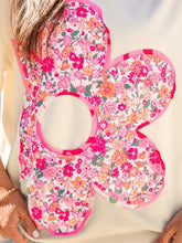 A vibrant pink and orange floral half sleeve oversized top with a flower-shaped pattern and white center mirror detail