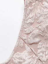 Floral jacquard peplum tank featuring a delicate pink lace dress with intricate off-white floral embroidery