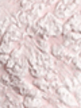 Pink and white floral jacquard peplum tank featuring textured fabric with a raised intricate pattern