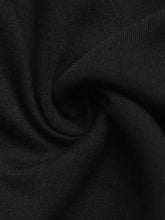 Black ribbed knit fabric with soft stretchy texture featured in floral peplum cami for comfortable stylish wear