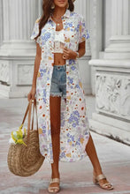 Floral print long duster coat with short sleeve length and button-down front