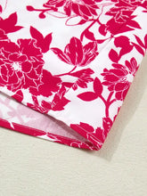 Floral print flutter sleeve blouse with vibrant red floral pattern and lace detail on a crisp white background