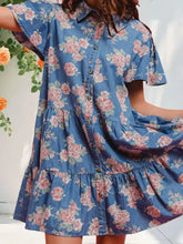 Blue denim floral print mini dress with pink roses green leaves short sleeves button-front and tiered ruffles