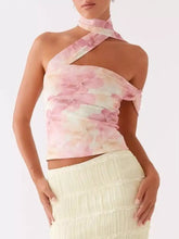A delicate pink and cream floral print halter neck cami with ruched texture and one-shoulder design