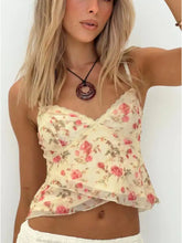 A cream floral print lace trim cami with pink roses and layered ruffle design in delicate lace trim fabric