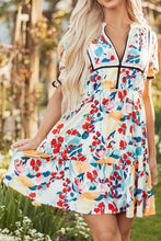 Floral Print Mini Dress with Black Trim and Ruffled Details