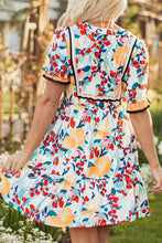 Floral Print Mini Dress with Black Trim and Ruffled Details