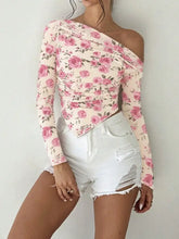Pink floral print one shoulder ruched blouse with long sleeves and a stylish ruched design