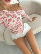 Pink floral print one shoulder ruched blouse featuring off-the-shoulder long sleeves and a ruched design