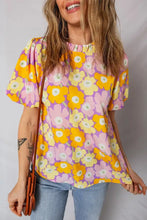 Floral print puff blouse with short puffed sleeves in vibrant purple yellow and pink shades for stylish wear