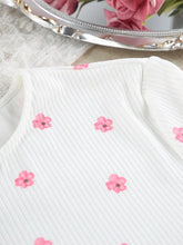 White ribbed top with pink floral prints and puffy sleeves from lounge set