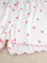 White floral dress with pink pattern and ruffled hem lounge set