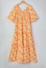 Floral print smocked V neck maxi dress in orange and white