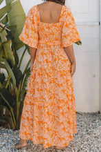 Orange floral print smocked V neck maxi dress with ruffles
